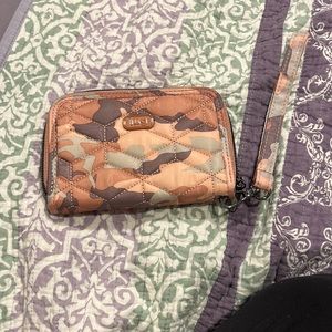 Lug Pink Cameo wristlet.